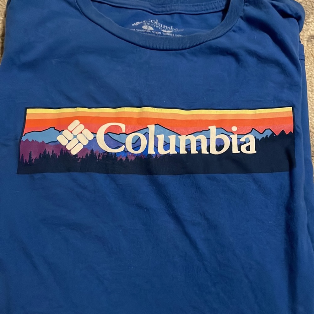 Blue Columbia t-shirt with logo on side little stain on back